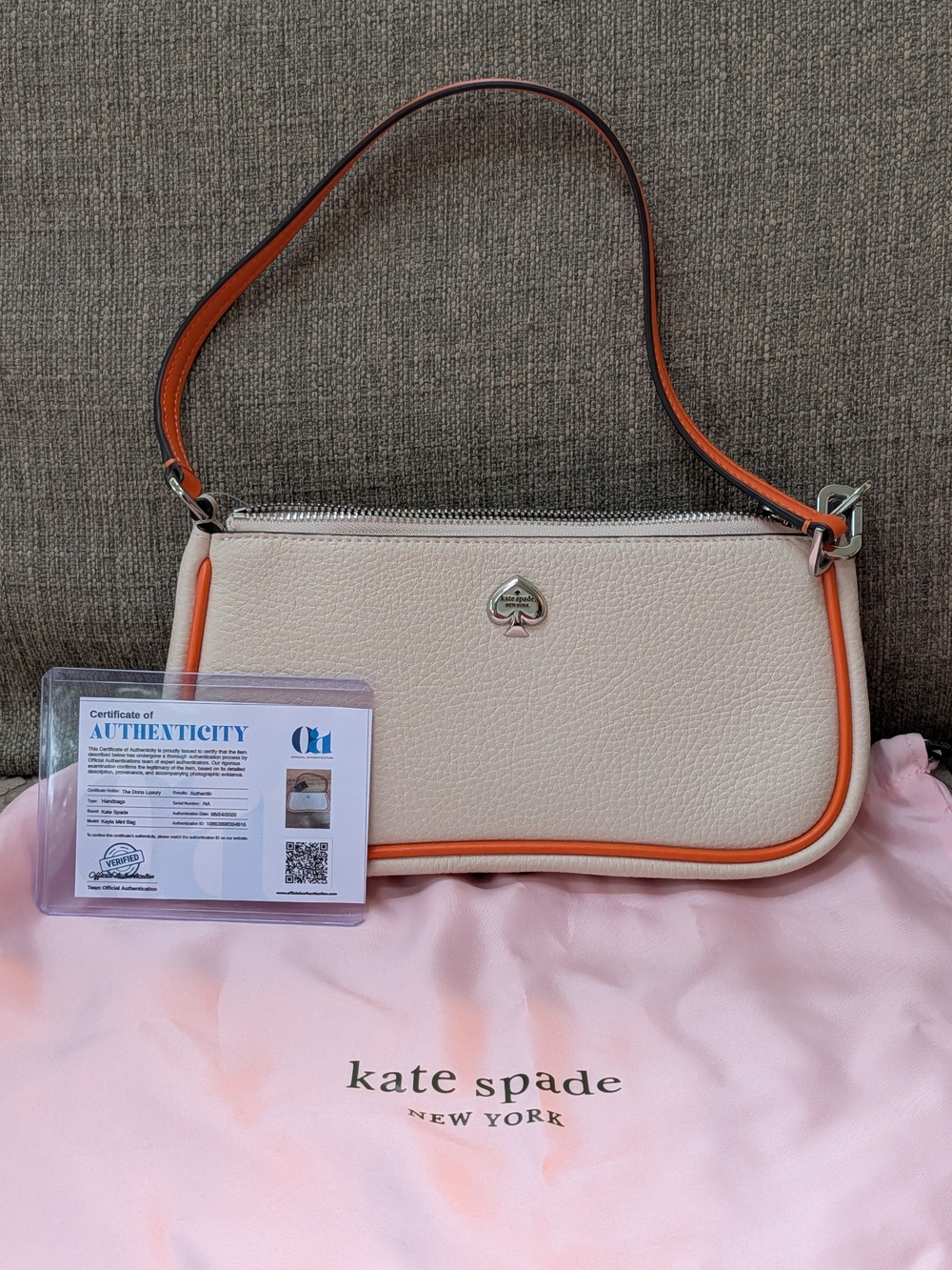 kate spade Cream Shoulder Bag with Orange Trim and Silver Spade Logo
